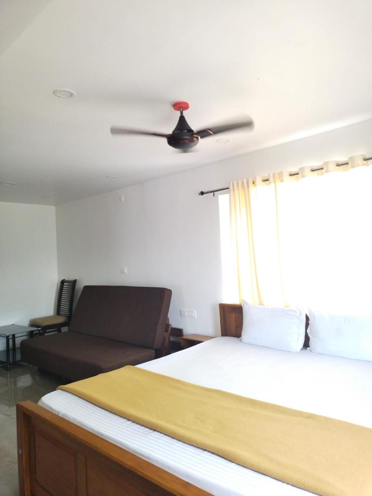 Blossom Valley Cottage Munnar Kamer foto